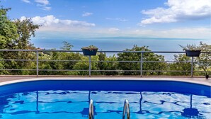 A swimming pool with a view of the sea and mountains. - Stunning Home in Icici With Wifi and 2 Bedrooms (Opatija)