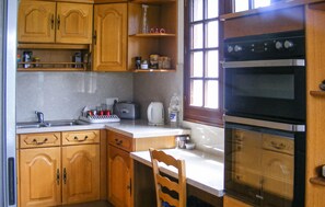 Fridge, oven, cookware/dishes/utensils