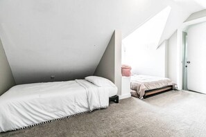 4 bedrooms, desk, iron/ironing board, travel cot
