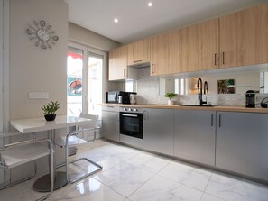 Fridge, microwave, oven, cookware/dishes/utensils