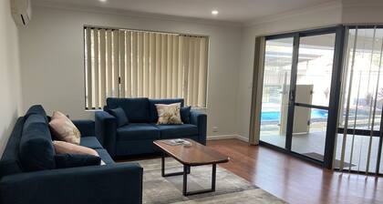 Central 3 Bed home with pool, EV Charger and unlimited free Wi-Fi