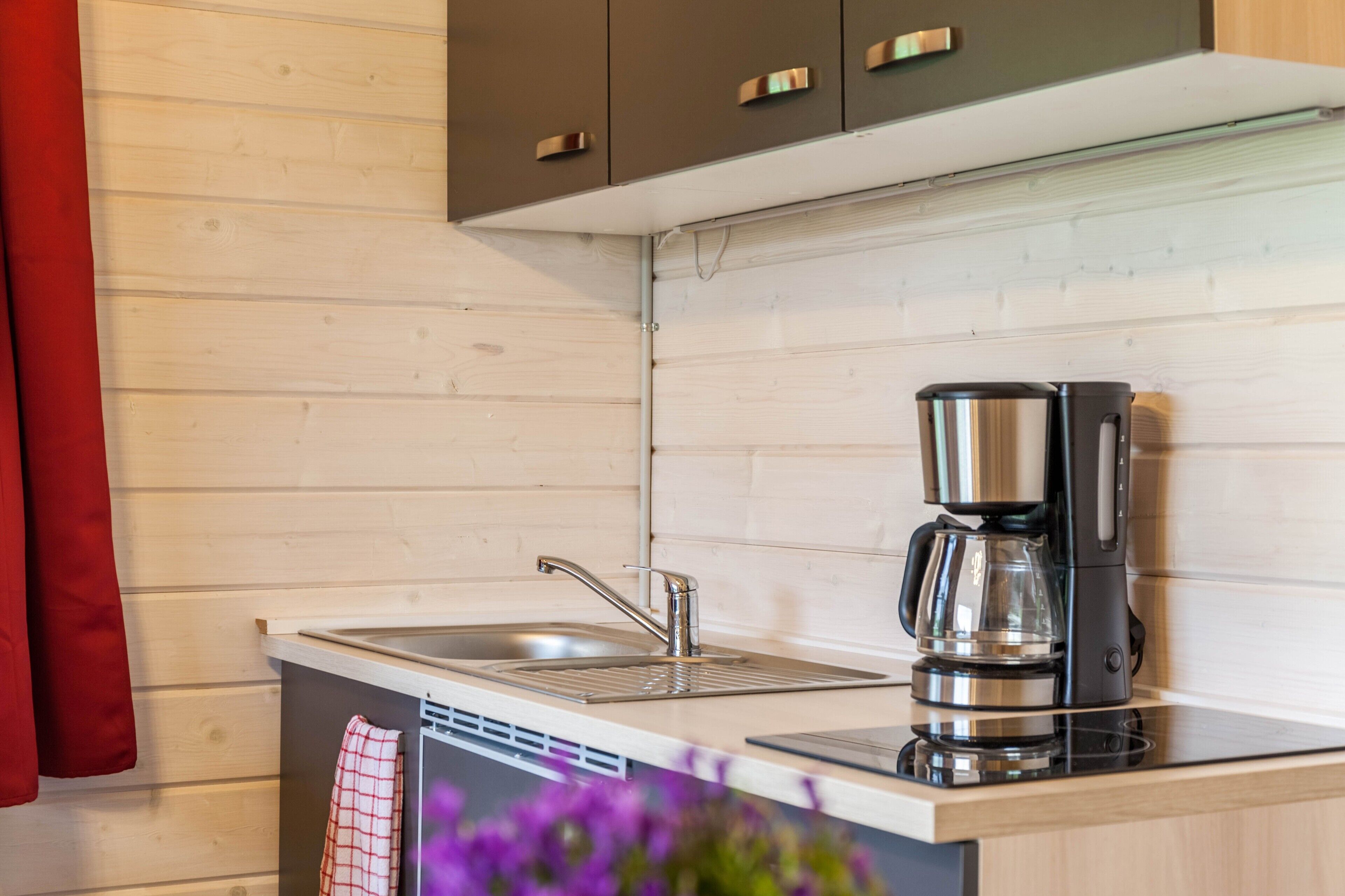 Fridge, stovetop, coffee/tea maker, electric kettle