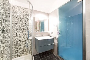 Bathtub, hair dryer, towels