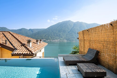 Ferienwohnung Colonno Penthouse mit Seeblick, Infinity-Pool und Whirlpool