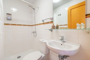 Badekar, hårføner og håndklær
