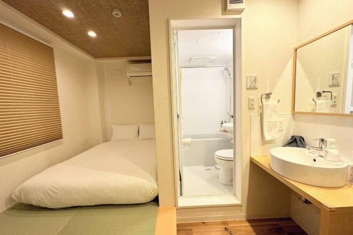 1 habitación, insonorización, wifi gratis y ropa de cama