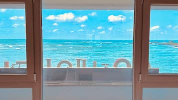 Chambre Deluxe avec lits jumeaux, vue partielle sur l'océan | Vue sur la plage/l’océan