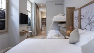 Standard Quadruple Room | Minibar, in-room safe, soundproofing, iron/ironing board