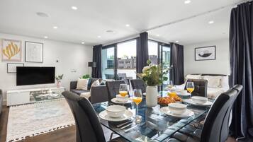 Exclusive Apartment, 2 Bedrooms, Non Smoking, Terrace | Living area | 30-inch flat-screen TV with digital channels, TV