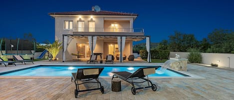 Outdoor pool, sun loungers