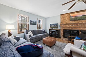 Flat-screen TV, fireplace, table football - Sandy Bottoms by Seaside Vacations & Sales (Chincoteague Island)