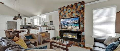 Smart TV, fireplace, books, offices