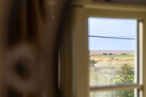 First floor: Sea views from the bedroom - Eastgate Cottage and Hideaway, Salthouse, Norfolk (Salthouse)