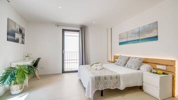 2 slaapkamers, een strijkplank/strijkijzer, gratis wifi, beddengoed