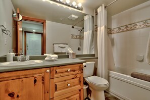 Combined shower/tub, soap, shampoo