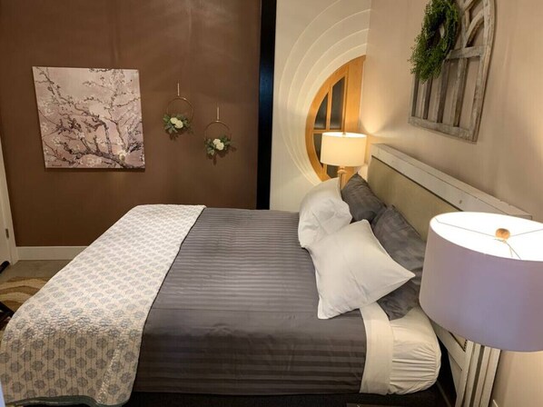 1 bedroom, desk, iron/ironing board, travel cot