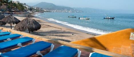 Beach nearby, sun loungers