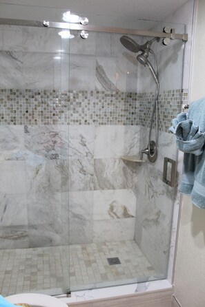 Shower, hair dryer, towels