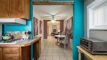 Fridge, microwave, stovetop, coffee/tea maker
