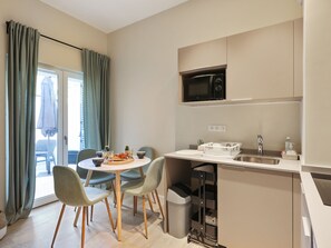 Fridge, microwave, coffee/tea maker, toaster