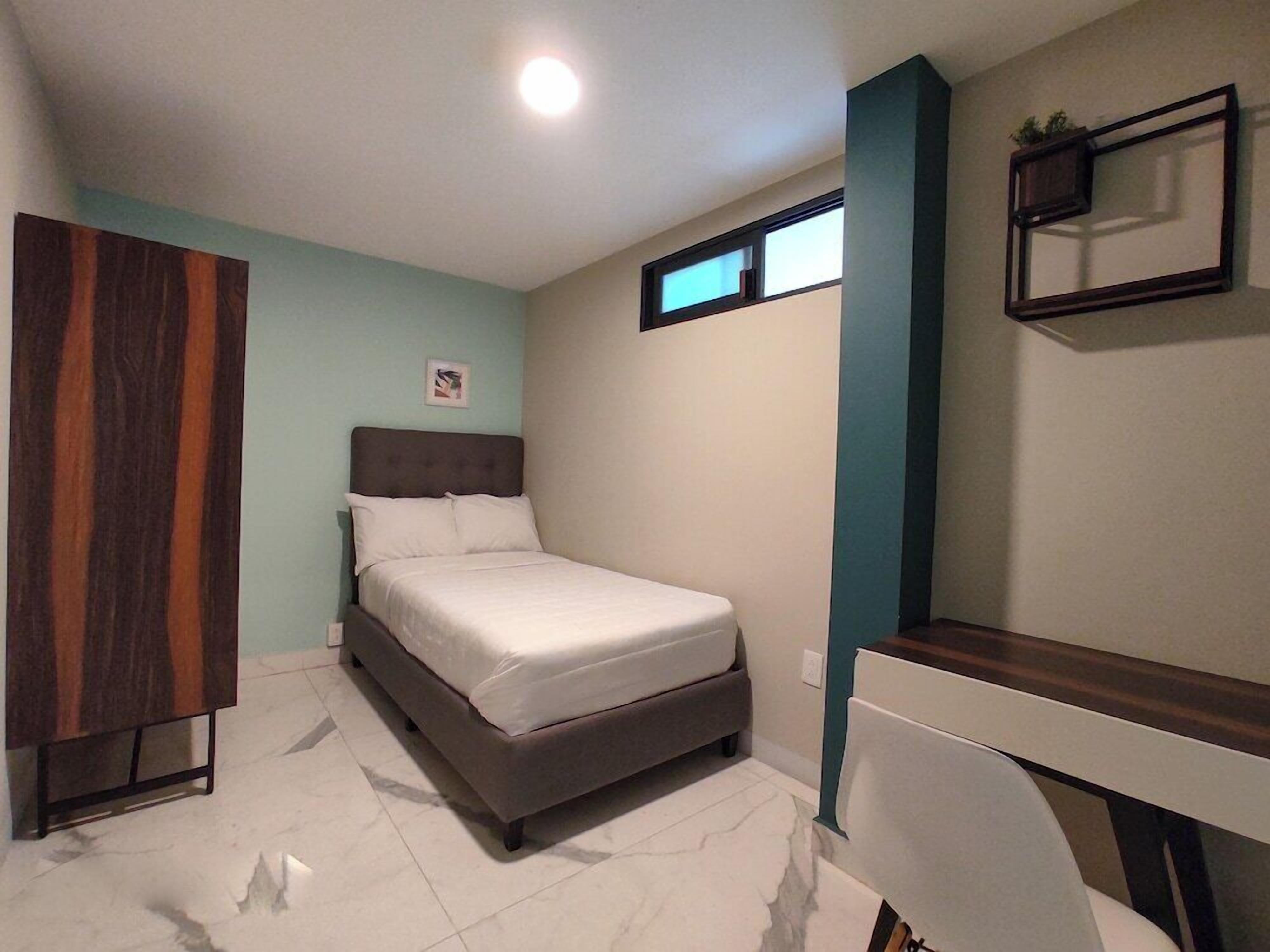 Blackout curtains, iron/ironing board, free WiFi, bed sheets