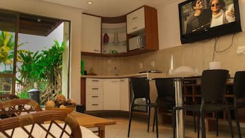Fridge, microwave, stovetop, coffee/tea maker