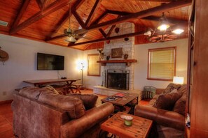 TV, fireplace - Llano River Ranch - Riverfront Cabin on 100 Acres! (Llano County)