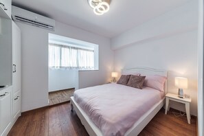 2 quartos, ferros/tábuas de passar roupa, Wi-Fi, roupa de cama