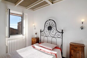2 dormitorios, tabla de planchar con plancha, wifi gratis y ropa de cama