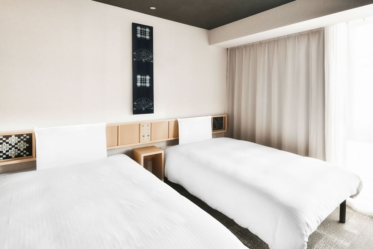 standard twin room, non smoking | 1 bedroom, down duvets, desk, blackout curtains