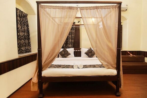 Heritage Family Room with Pool view | Minibar, free WiFi, bed sheets