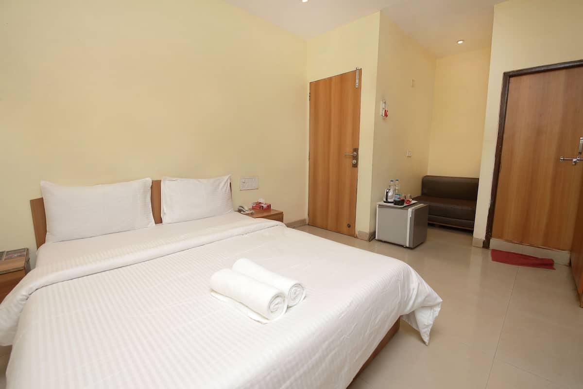 Een minibar, gratis wifi, beddengoed
