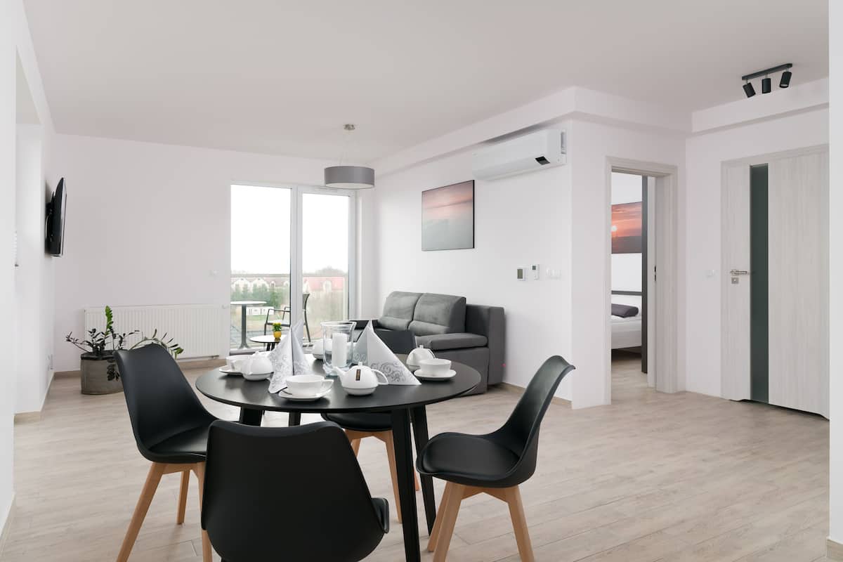 Apartment, 2 Bedrooms | Living room | 49-inch flat-screen TV with satellite channels, TV
