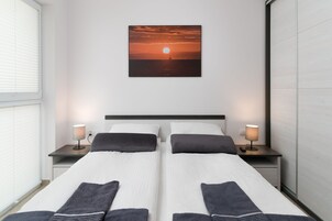 Economy Apartment | Iron/ironing board, cribs/infant beds, free WiFi, bed sheets