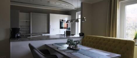 Deluxe Condo | Private kitchen | Fridge, stovetop, cookware/dishes/utensils