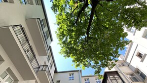 A multi-story building with balconies and windows. - Starowiślna 41-43 by PI Apartments (Kraków)
