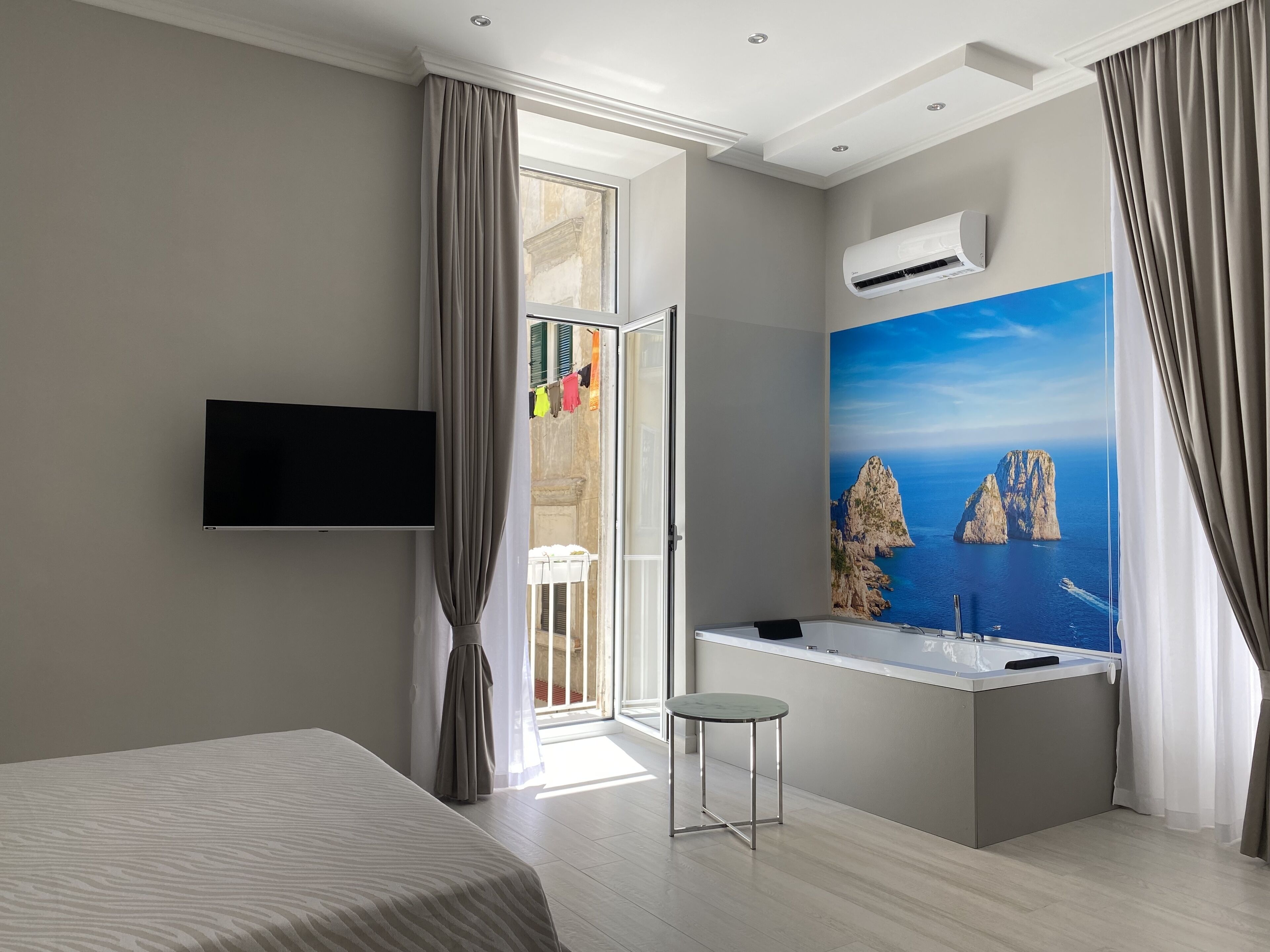 Luxury Room, Jetted Tub | Minibar, in-room safe, desk, blackout drapes