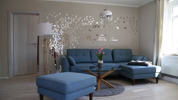 40-inch flat-screen TV with satellite channels, TV