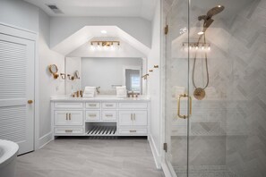 Bathtub, hair dryer, towels