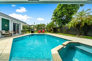 Outdoor pool, a heated pool, sun loungers