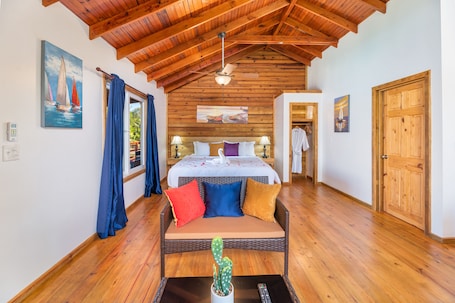 Premium bedding, memory foam beds, in-room safe, individually decorated. Hotel and Dive Center Roatan Yacht Club