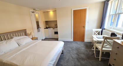 Grace Apartments - Living Rock