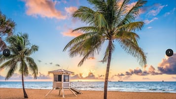 On the beach, sun loungers, beach towels