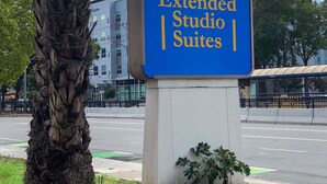 A sign for Extended Studio Suites with a simple house icon. - Super 8 by Wyndham San Jose Airport (San Jose)