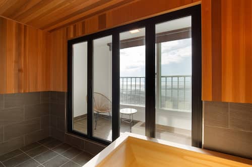 Habitación doble Deluxe | Baño | Tina y regadera independientes y tina con aguas termales