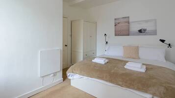 Apartment, 1 King Bed | 1 bedroom, iron/ironing board, free WiFi, bed sheets