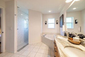 Combined shower/tub, hair dryer, towels, soap