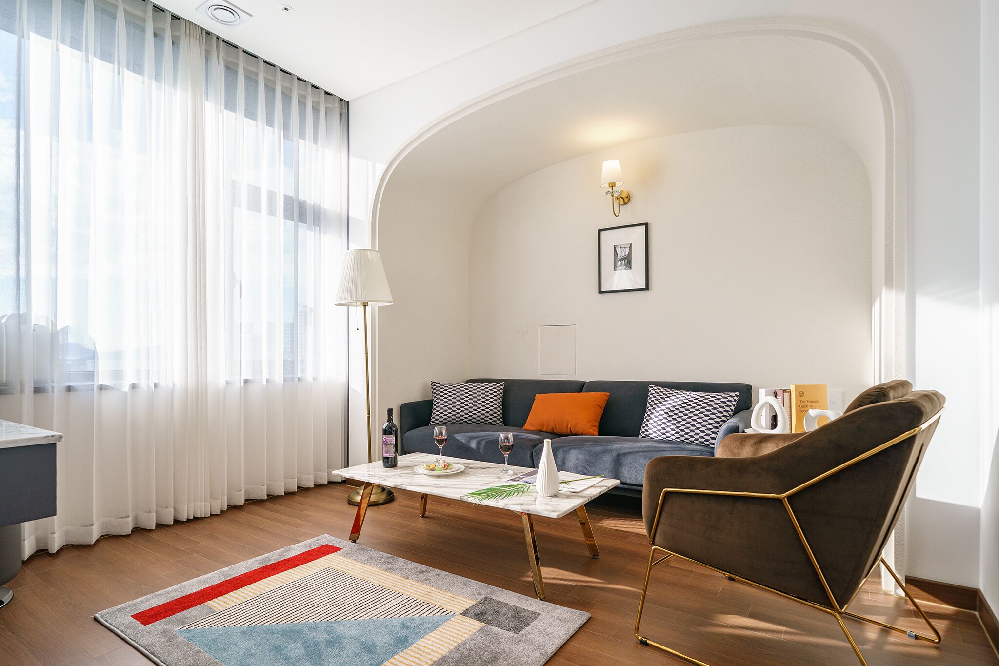 premium studio suite | living area | 55-inch smart tv with digital channels, tv, heated floors