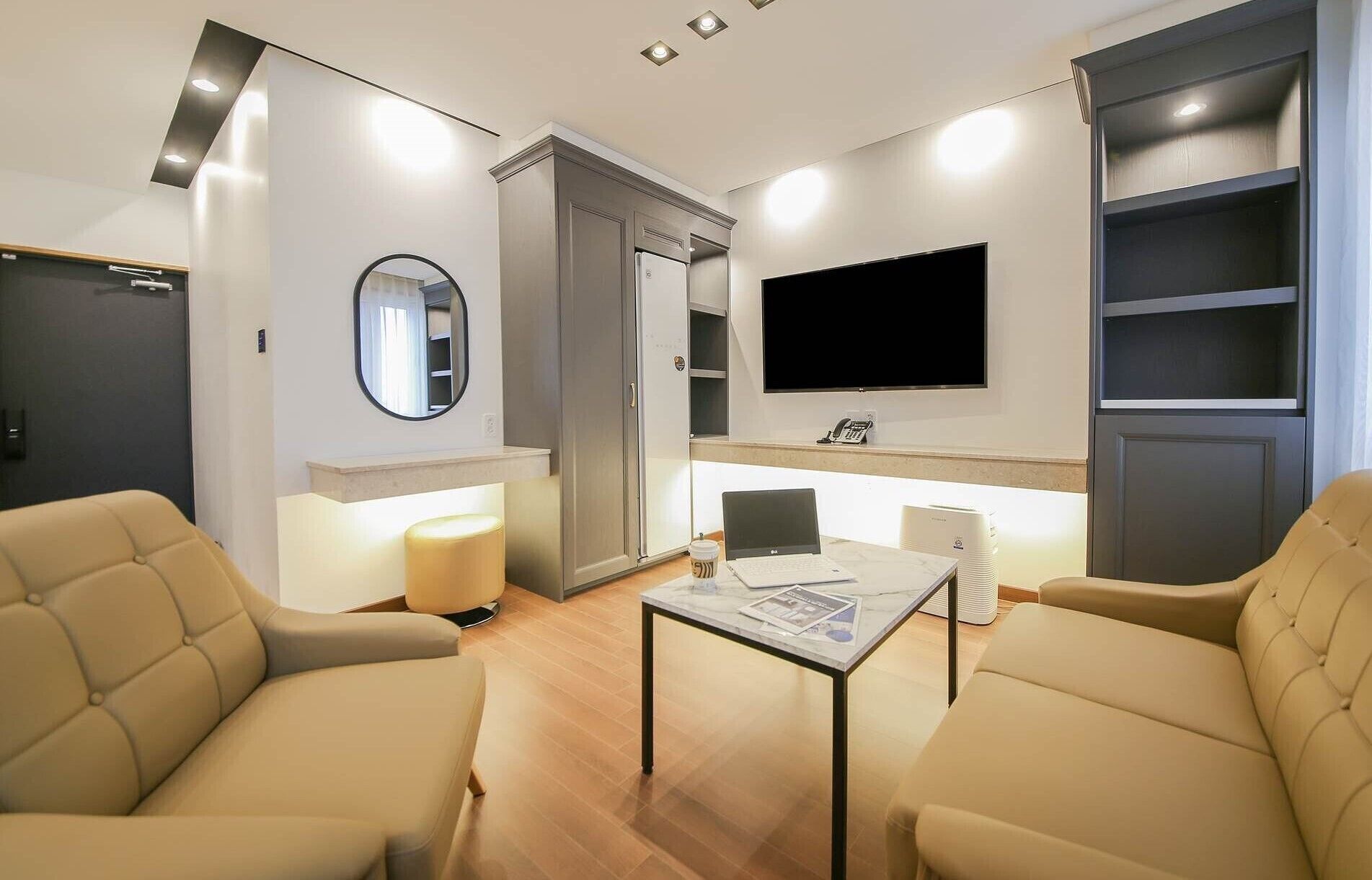 junior twin room | living area | 55-inch smart tv with digital channels, tv, heated floors