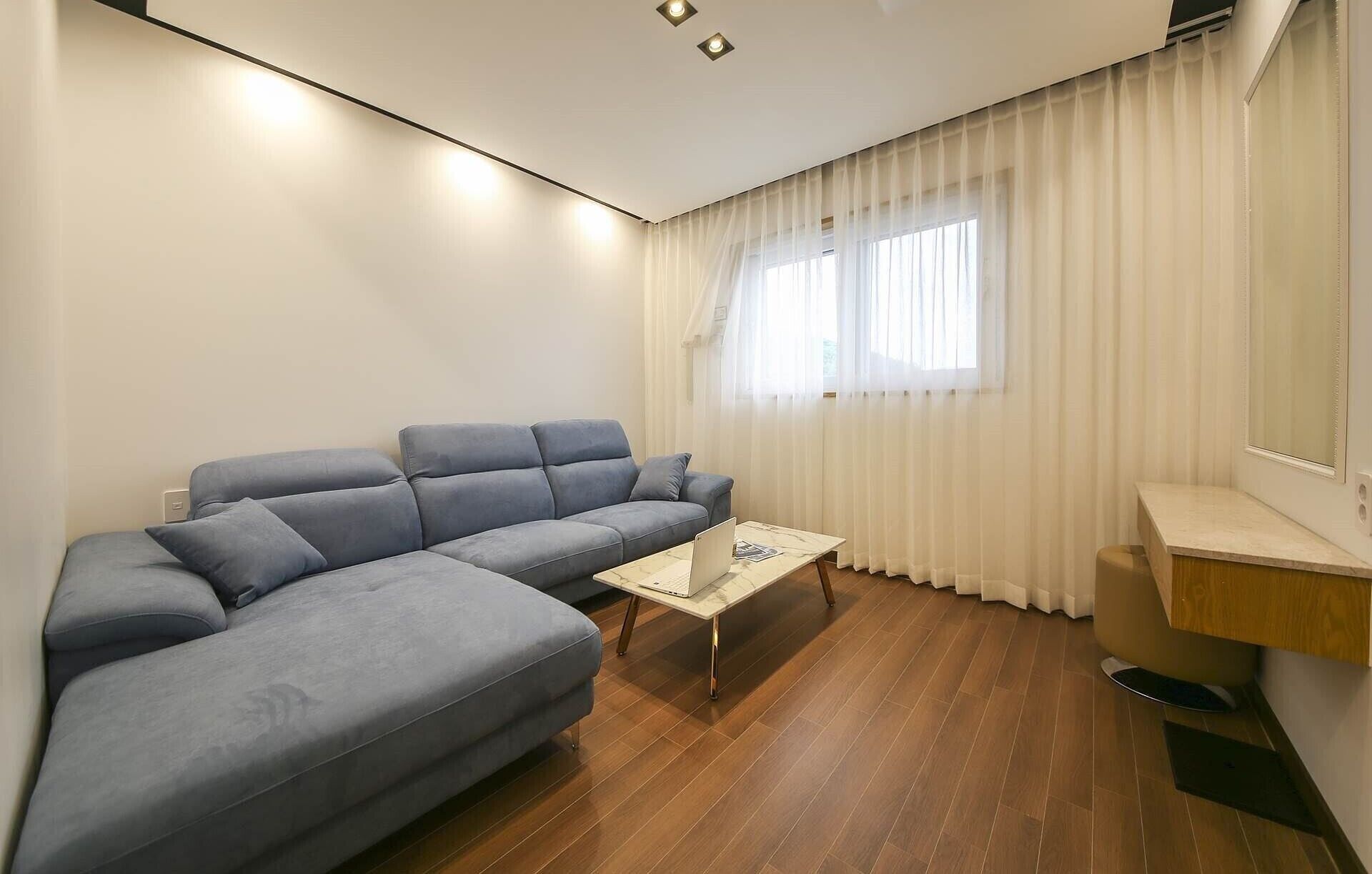 family twin room | living area | 55-inch smart tv with digital channels, tv, heated floors